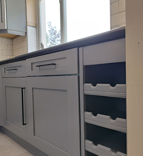 Lower-oak-cabinets-after-Little-Greene-paint-respray-with-factory-grade-finish