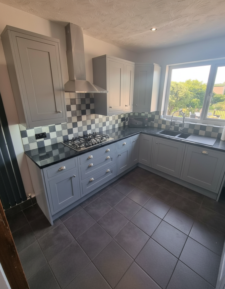 Transformed kitchen featuring a modern grey, finish RAL 7042 after expert oak cabinet respraying in Limerick