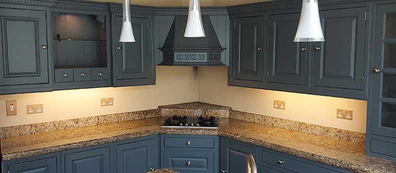 Finished kitchen respray with blue grey cabinets and smooth painted finish in Ireland